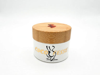 Twerk Crème Deluxe Miniature next to the full-size 8.8 oz jar for size comparison